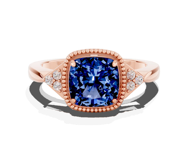 Rose gold Cushion Cut Blue Sapphire Halo Ring with Tapered Band and Four-Prong Setting