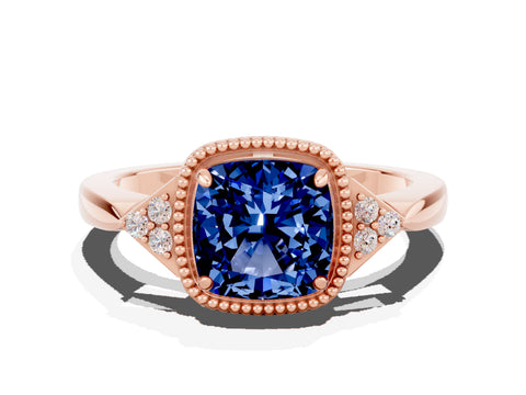 Rose gold Cushion Cut Blue Sapphire Halo Ring with Tapered Band and Four-Prong Setting