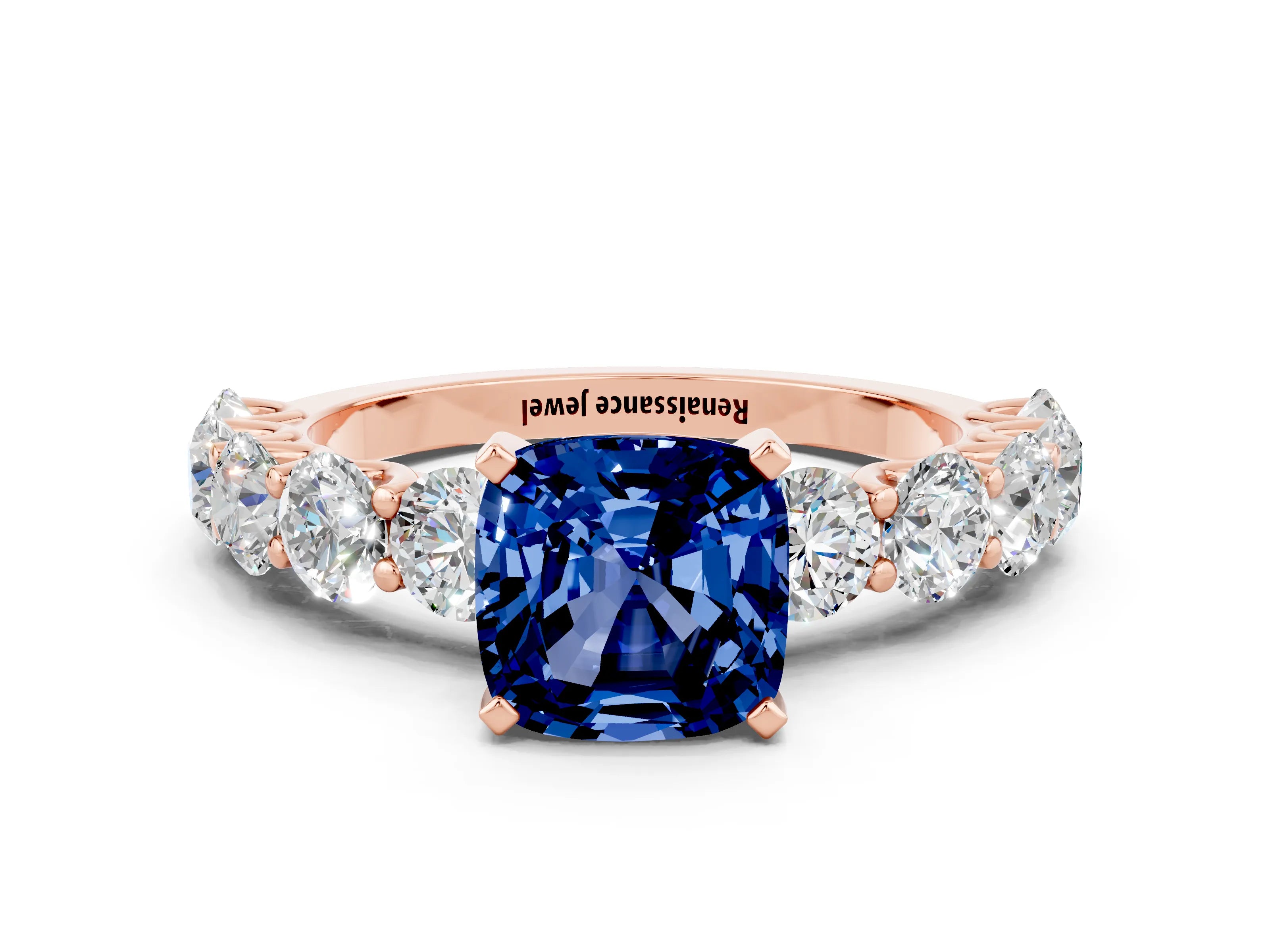 Rose gold Cushion Cut Blue Sapphire Prong Setting with Side Stones on a Pave Band