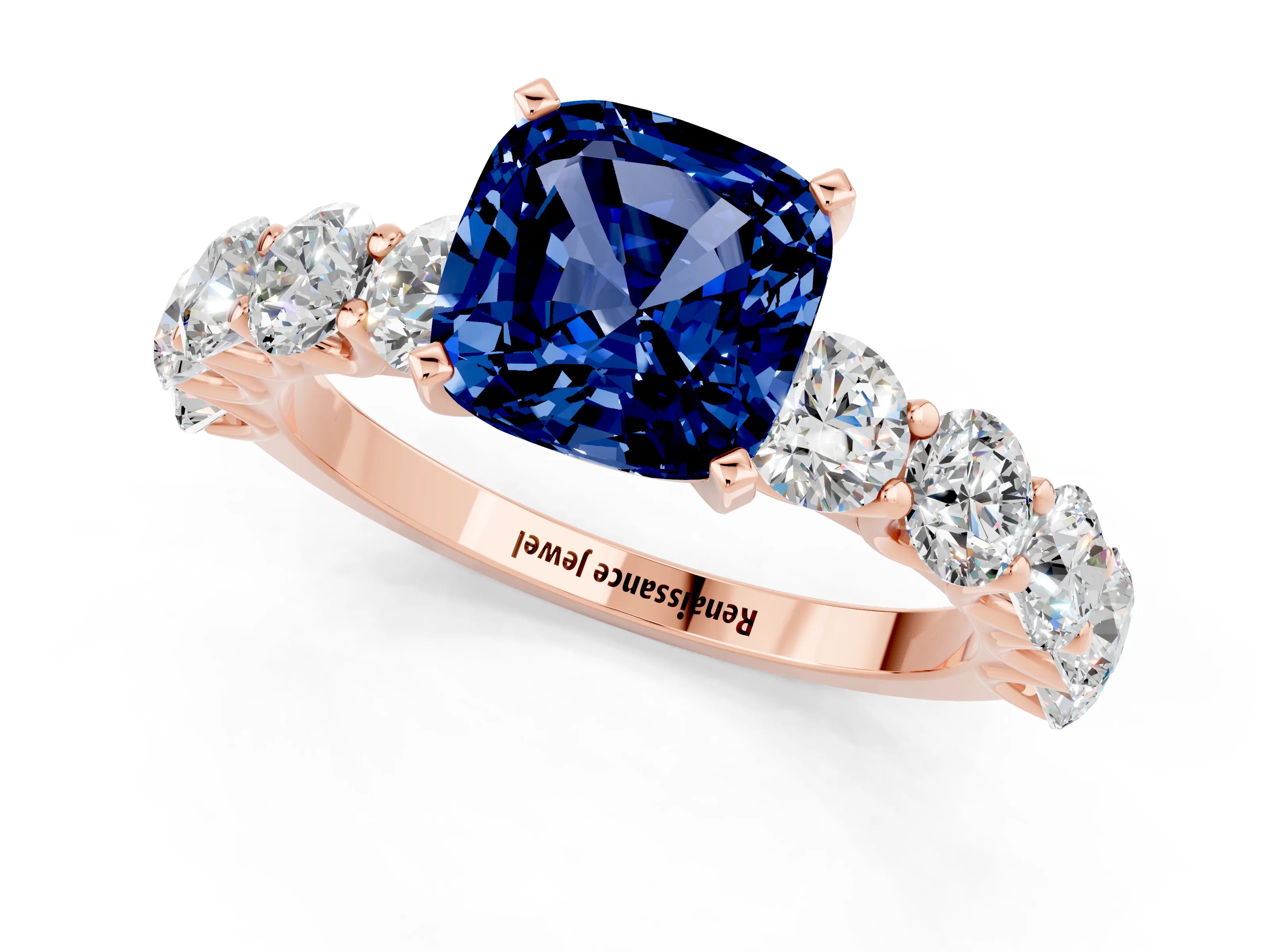 Rose gold Cushion Cut Blue Sapphire Prong Setting with Side Stones on a Pave Band_1