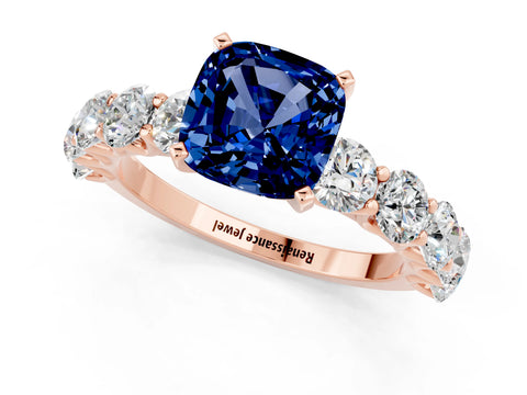 Rose gold Cushion Cut Blue Sapphire Prong Setting with Side Stones on a Pave Band_1