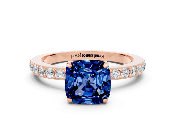Rose gold Cushion Cut Blue Sapphire Solitaire Engagement Ring with Pavé Band and Four-Prong Setting