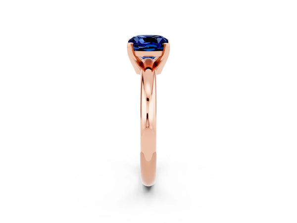 Rose gold Cushion Cut Blue Sapphire Solitaire Engagement Ring with Round Band and Four-Prong Setting