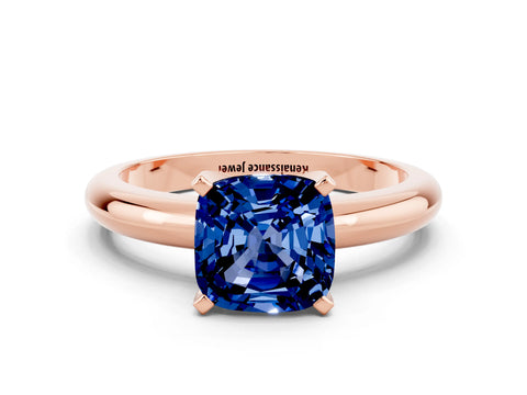 Rose gold Cushion Cut Blue Sapphire Solitaire Engagement Ring with Round Band and Four-Prong Setting