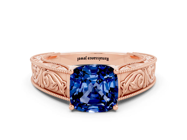 Rose gold Cushion Cut Blue Sapphire Solitaire Ring with Engraved Band and Four-Prong Setting
