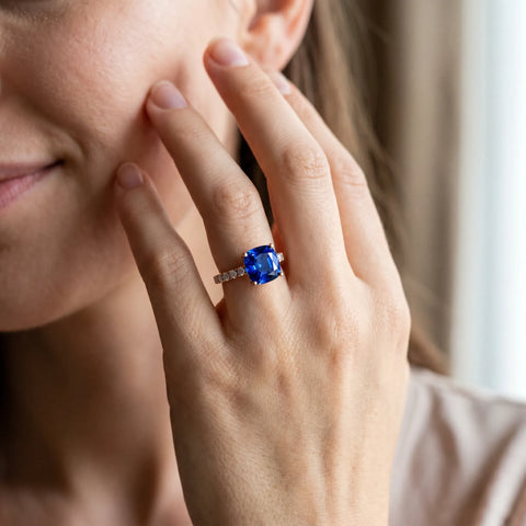 Rose gold Cushion Cut Blue Sapphire Solitaire Ring with Round  Pavé Band and Four-Prong Setting_44