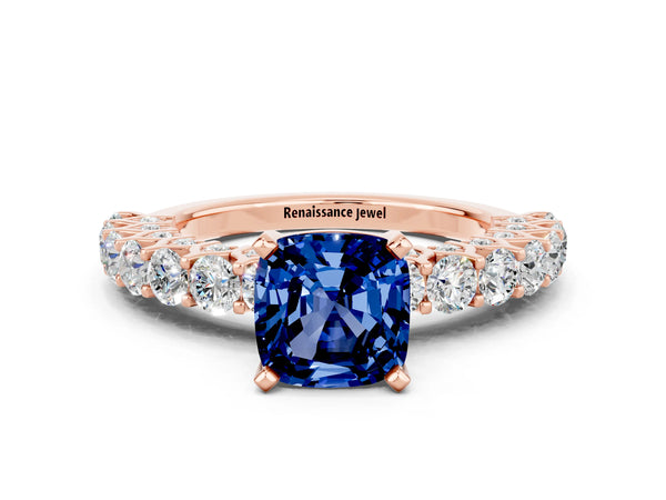 Rose gold Cushion Cut Blue Sapphire Solitaire Ring with Shared Prong Pavé Band and Four-Prong Setting