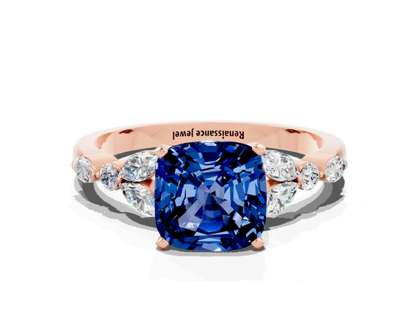 Rose gold Cushion Cut Blue Sapphire Solitaire Ring with Side Stones and Four-Prong Setting