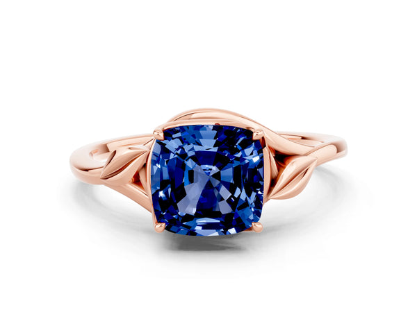 Rose gold Cushion Cut Blue Sapphire Solitaire Ring with Twist Band and Four-Prong Setting