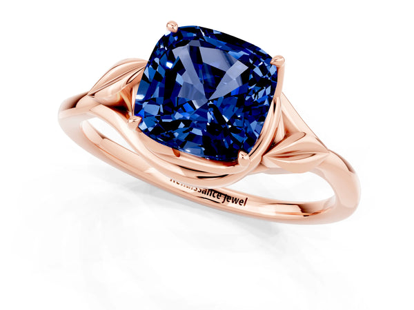 Rose gold Cushion Cut Blue Sapphire Solitaire Ring with Twist Band and Four-Prong Setting