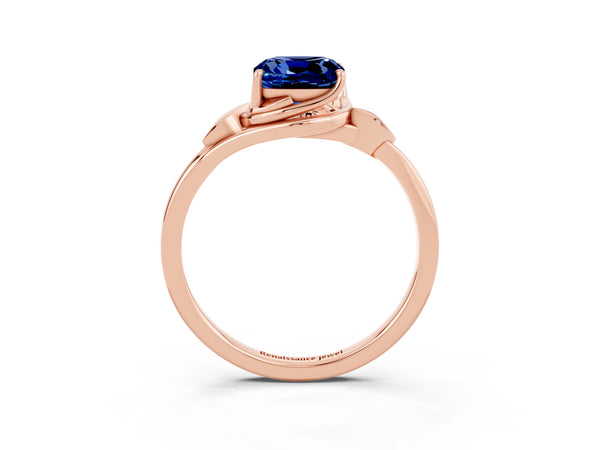 Rose gold Cushion Cut Blue Sapphire Solitaire Ring with Twist Band and Four-Prong Setting