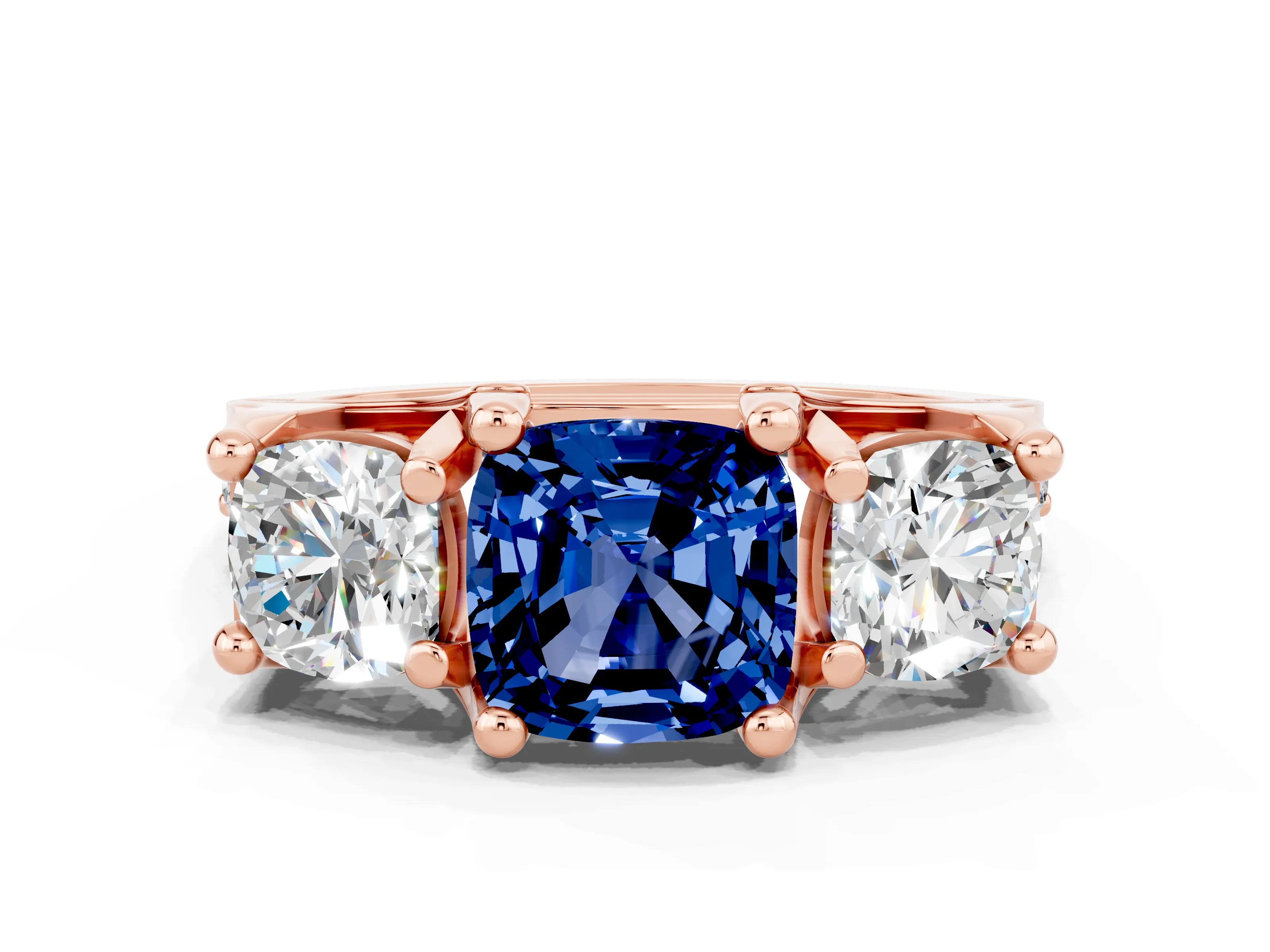 Rose gold Cushion Cut Blue Sapphire Three-Stone Ring with Channel Set Band and Four-Prong Setting