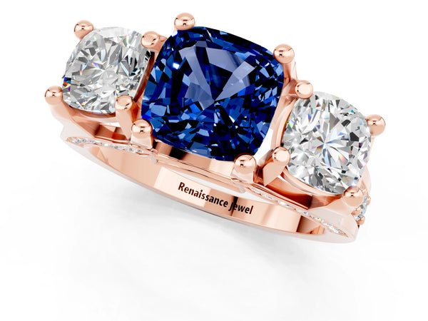 Rose gold Cushion Cut Blue Sapphire Three-Stone Ring with Channel Set Band and Four-Prong Setting
