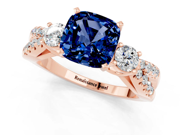 Rose gold Cushion Cut Blue Sapphire Three-Stone Ring with Pavé Split Shank and Four-Prong Setting