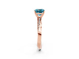 Rose gold Cushion Cut Blue Topaz Engagement Ring with Side Stone Accents and Four-Prong Setting_26