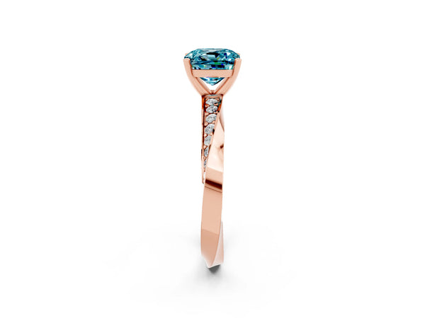 Rose gold Cushion Cut Blue Topaz Engagement Ring with Side Stone Accents and Four-Prong Setting