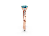 Rose gold Cushion Cut Blue Topaz Engagement Ring with Side Stone Accents and Four-Prong Setting_86