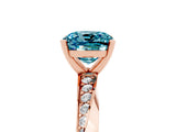 Rose gold Cushion Cut Blue Topaz Engagement Ring with Side Stone Accents and Four-Prong Setting_89