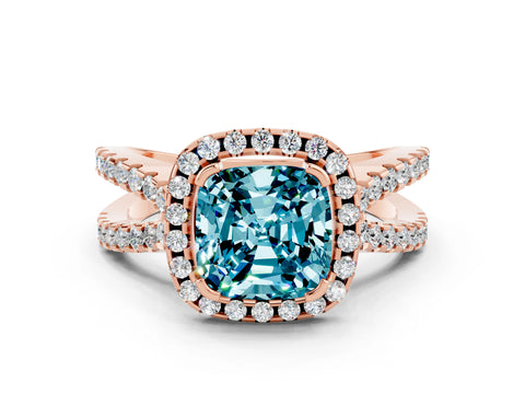 Rose gold Cushion Cut Blue Topaz Halo Ring with Split Shank Pavé Band and Prong Setting