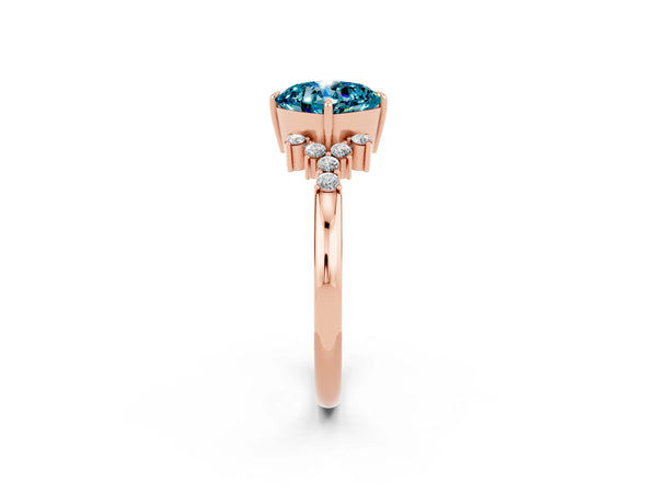 Rose gold Cushion Cut Blue Topaz Ring with Side Stones and Four-Prong Setting
