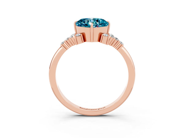 Rose gold Cushion Cut Blue Topaz Ring with Side Stones and Four-Prong Setting