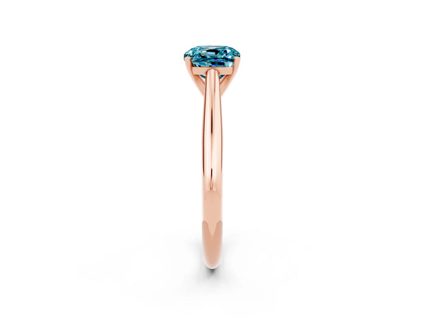 Rose gold Cushion Cut Blue Topaz Solitaire Engagement Ring with Cathedral Setting and Four-Prong Mount