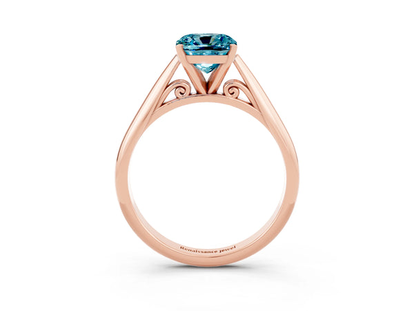 Rose gold Cushion Cut Blue Topaz Solitaire Engagement Ring with Cathedral Setting and Four-Prong Mount