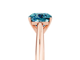 Rose gold Cushion Cut Blue Topaz Solitaire Engagement Ring with Cathedral Setting and Four-Prong Mount_83