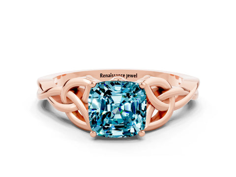 Rose gold Cushion Cut Blue Topaz Solitaire Engagement Ring with Celtic Knot Band and Four-Prong Setting
