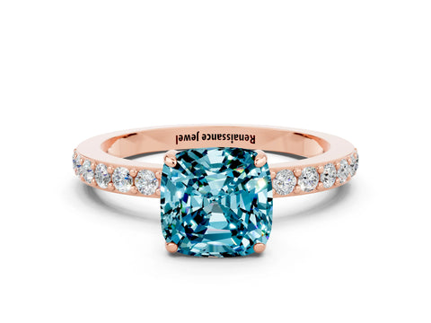 Rose gold Cushion Cut Blue Topaz Solitaire Engagement Ring with Pavé Band and Four-Prong Setting