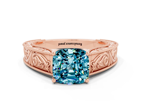 Rose gold Cushion Cut Blue Topaz Solitaire Ring with Engraved Band and Four-Prong Setting