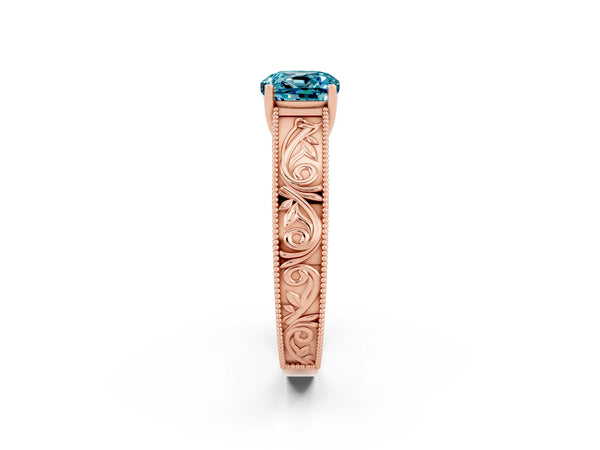Rose gold Cushion Cut Blue Topaz Solitaire Ring with Engraved Band and Four-Prong Setting