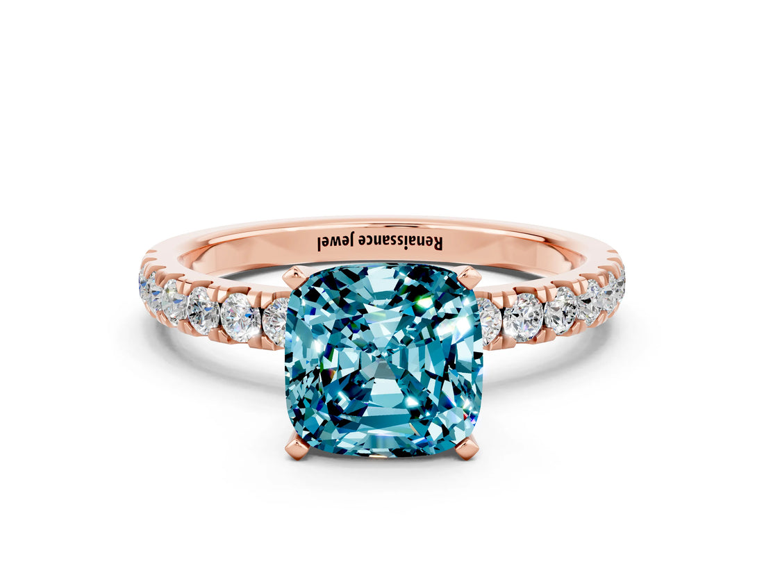 Rose gold Cushion Cut Blue Topaz Solitaire Ring with Pavé Accents and Four-Prong Setting