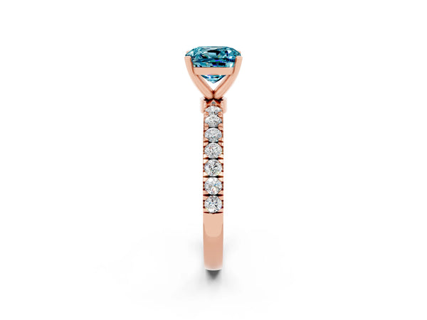 Rose gold Cushion Cut Blue Topaz Solitaire Ring with Pavé Accents and Four-Prong Setting