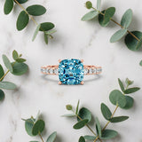 Rose gold Cushion Cut Blue Topaz Solitaire Ring with Round  Pavé Band and Four-Prong Setting_57