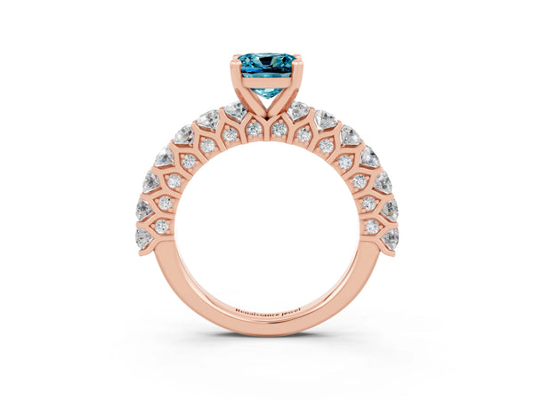 Rose gold Cushion Cut Blue Topaz Solitaire Ring with Shared Prong Pavé Band and Four-Prong Setting
