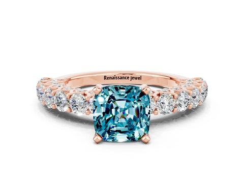 Rose gold Cushion Cut Blue Topaz Solitaire Ring with Shared Prong Pavé Band and Four-Prong Setting
