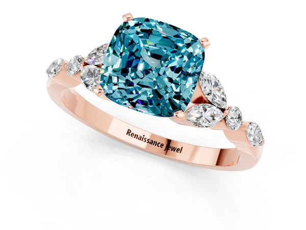 Rose gold Cushion Cut Blue Topaz Solitaire Ring with Side Stones and Four-Prong Setting