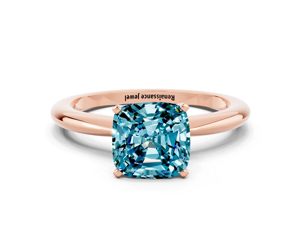 Rose gold Cushion Cut Blue Topaz Solitaire Ring with Six-Prong Setting and Classic Band