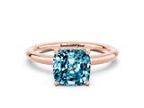 Rose gold Cushion Cut Blue Topaz Solitaire Ring with Thin Band and Four-Prong Setting