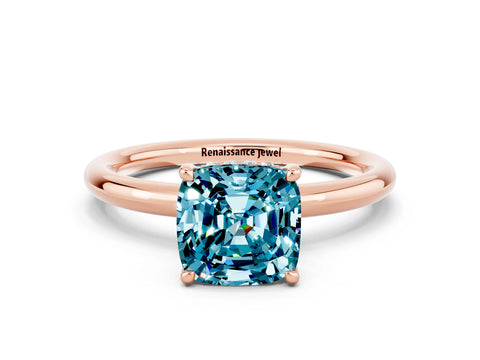 Rose gold Cushion Cut Blue Topaz Solitaire Ring with Thin Band and Four-Prong Setting