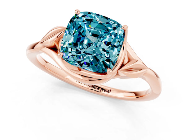 Rose gold Cushion Cut Blue Topaz Solitaire Ring with Twist Band and Four-Prong Setting