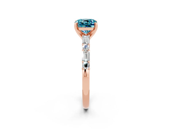 Rose gold Cushion Cut Blue Topaz Solitaire with Side Baguettes and Channel Set Band