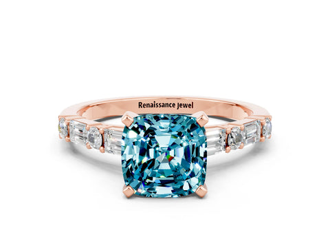 Rose gold Cushion Cut Blue Topaz Solitaire with Side Baguettes and Channel Set Band