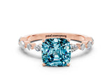 Rose gold Cushion Cut Blue Topaz Solitaire with Side Stones on a Pavé Band and Four-Prong Setting