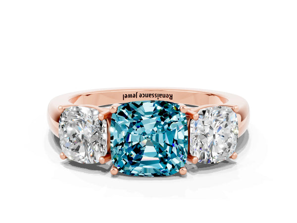 Rose gold Cushion Cut Blue Topaz Three-Stone Ring with Four-Prong Setting and Classic Band