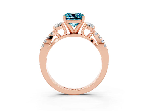 Rose gold Cushion Cut Blue Topaz Three-Stone Ring with Pavé Split Shank and Four-Prong Setting