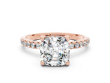 Rose gold Cushion Cut Diamond Solitaire Ring with Four-Prong Setting and Pavé Band