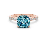Rose gold Cushion Cut Diamond Solitaire Ring with Four-Prong Setting and Pavé Band