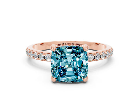 Rose gold Cushion Cut Diamond Solitaire Ring with Four-Prong Setting and Pavé Band